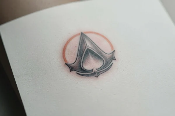 30 Magical Small Assassins Creed Inspired Tattoos for True Fans